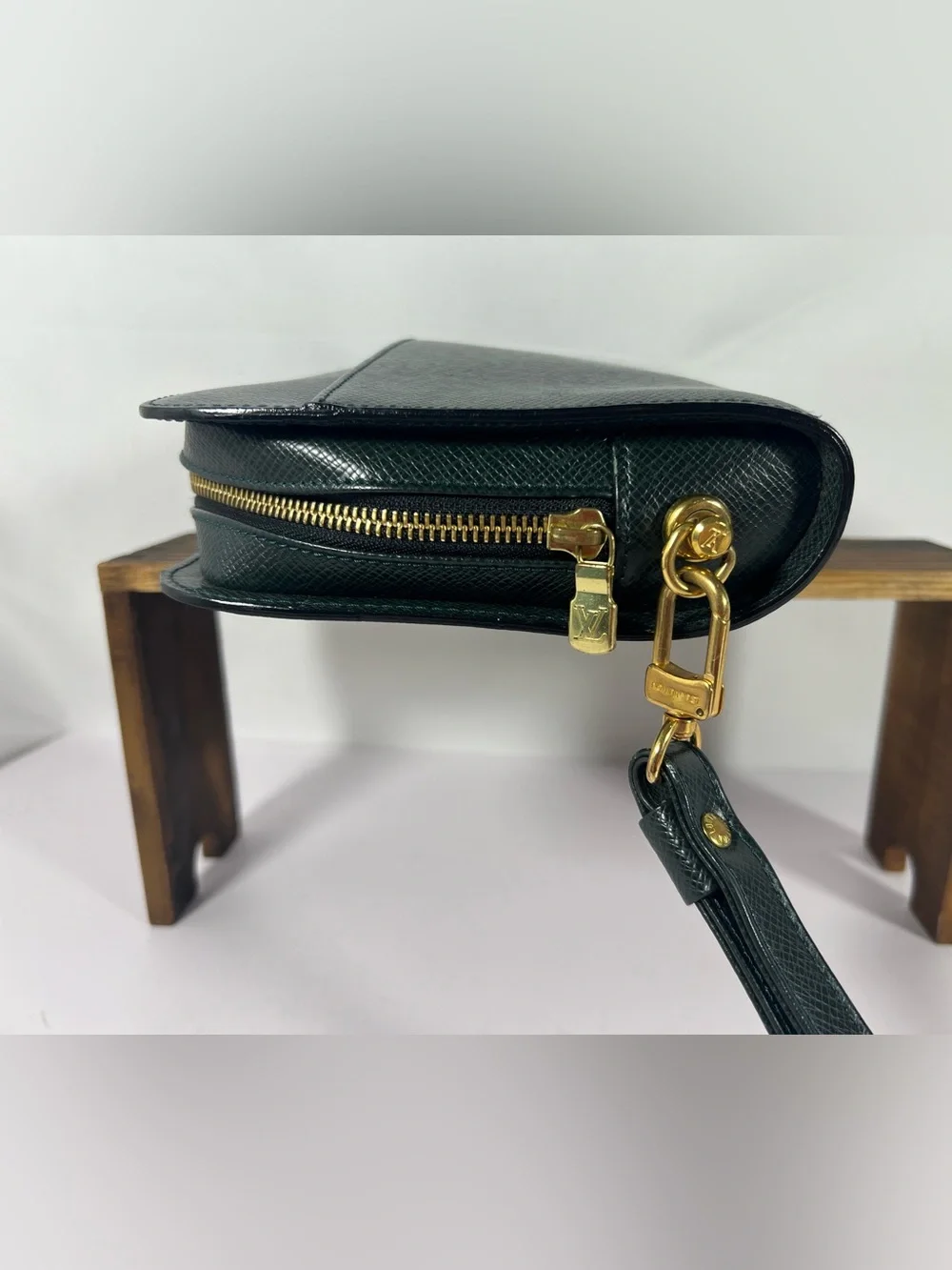 7101: Louis Vuitton Taiga Baikal Wristlet Clutch Pouch Green